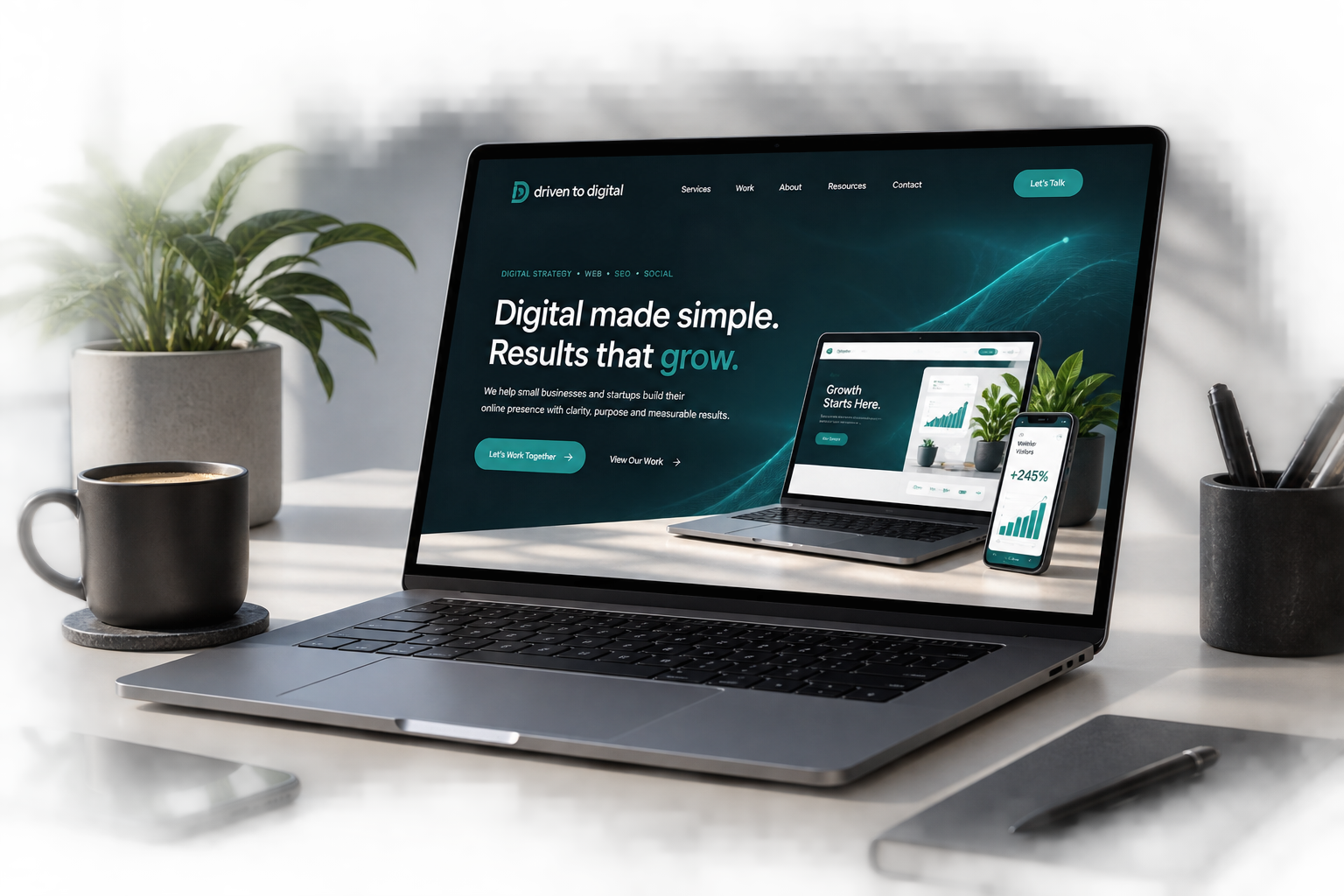 Driven to Digital website displayed on a laptop in a modern workspace
